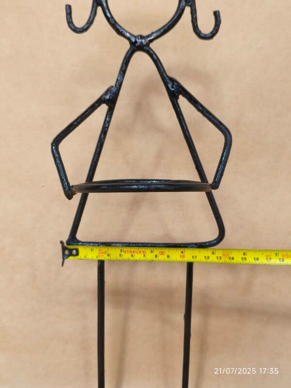 IMG_20250721_173548 Niña porta maceta